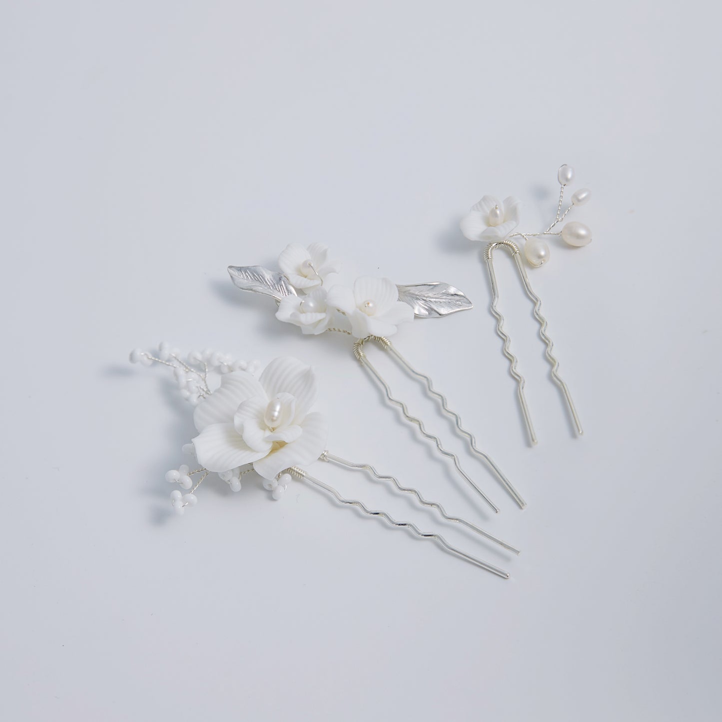 Set mit 3 eleganten Braut-Haarnadeln mit Blumenmuster aus Perlen und Porzellan