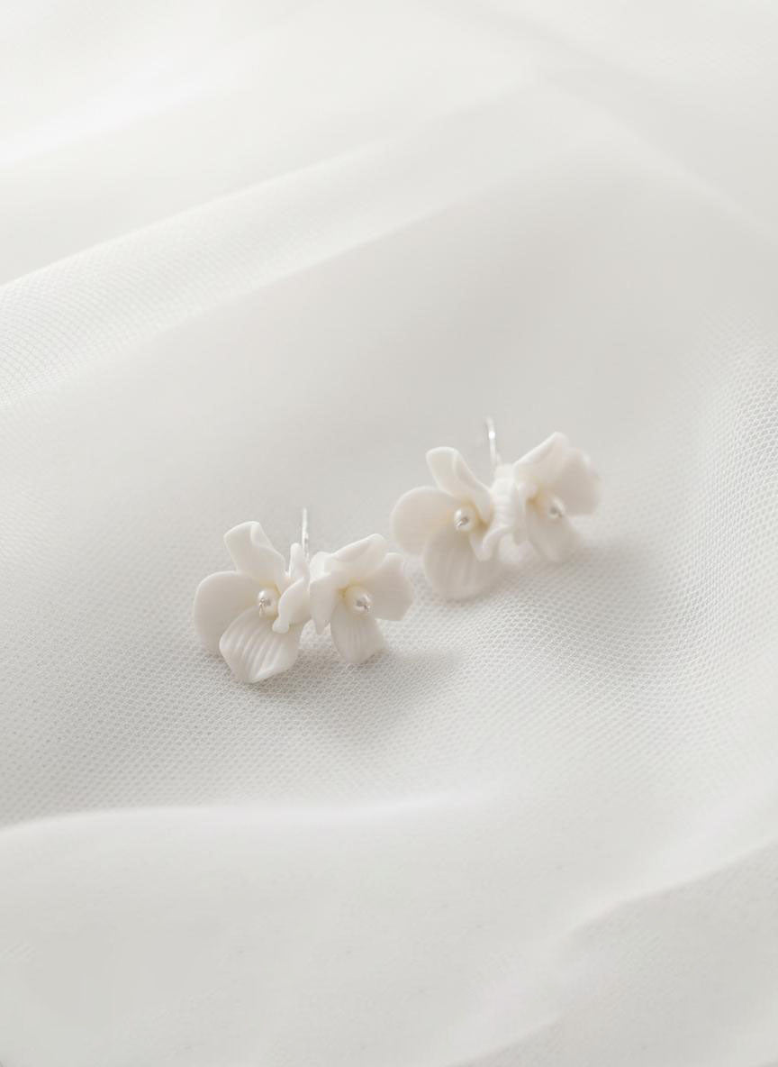White ceramic flower stud earrings with gold detailing for brides, 4cm lightweight hypoallergenic wedding earrings