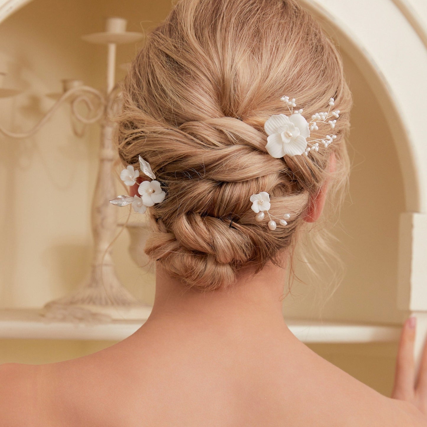 Set of 3 Elegant Pearl and Porcelain Floral Bridal Hairpins. Each hairpin features beautifully hand sculpted porcelain blossoms and dainty freshwater pearls, intricately arranged and hardwired using gold or silver plated wire.