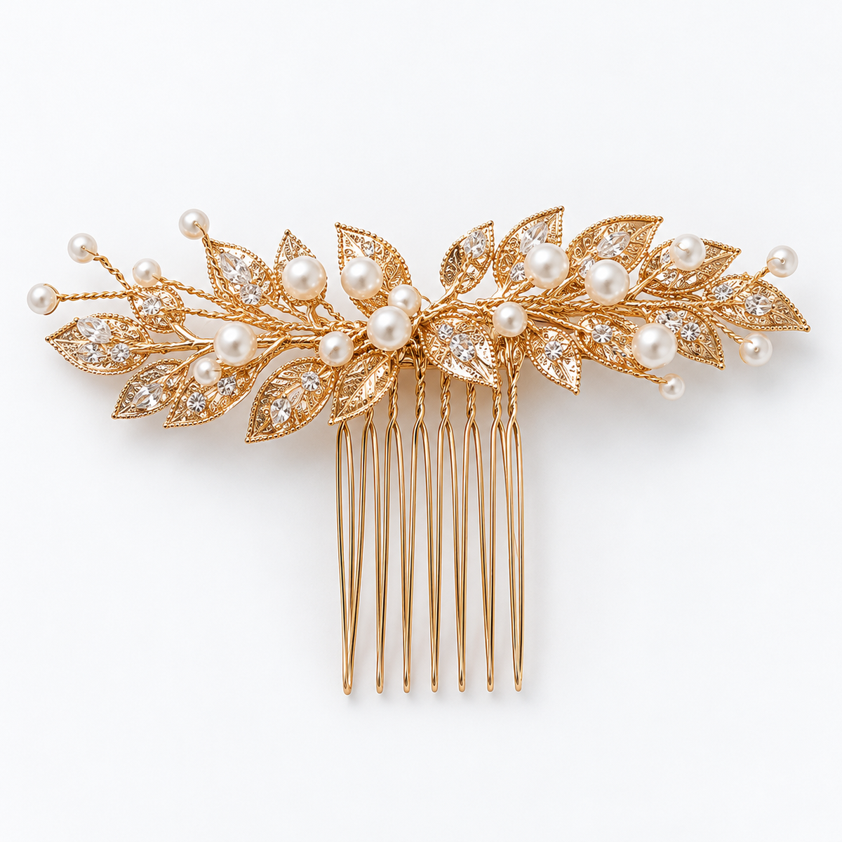 Front view of a single gold leaf bridal hair comb with white pearl-like beads and clear cubic zirconia stones on a white-grey background