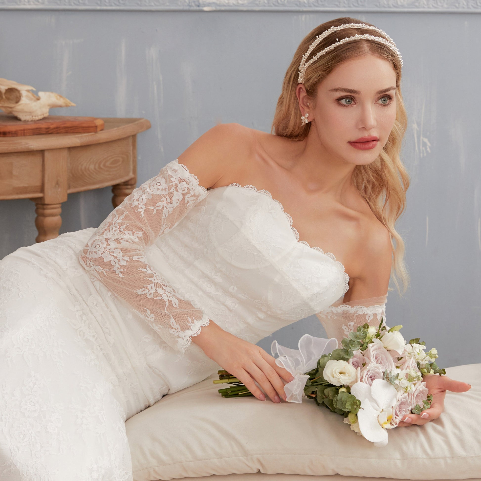 Stunning Baby's Breath-inspired wedding headband. Featuring two rows of delicate faux pearls resembling Baby's Breath flowers, this stunning bridal accessory adds a touch of magic to your wedding look.