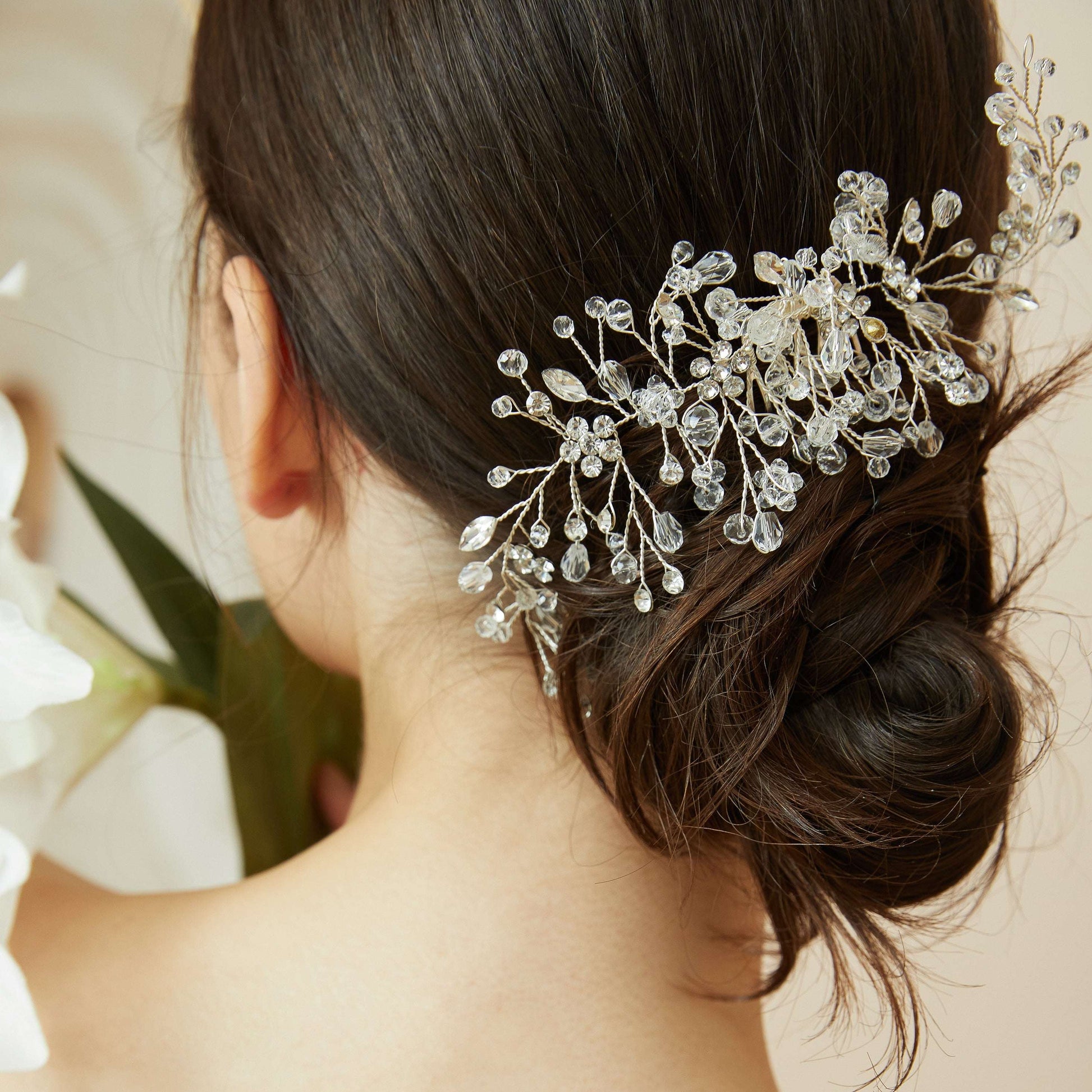 Bridesmaid wearing a vintage-inspired crystal hair comb