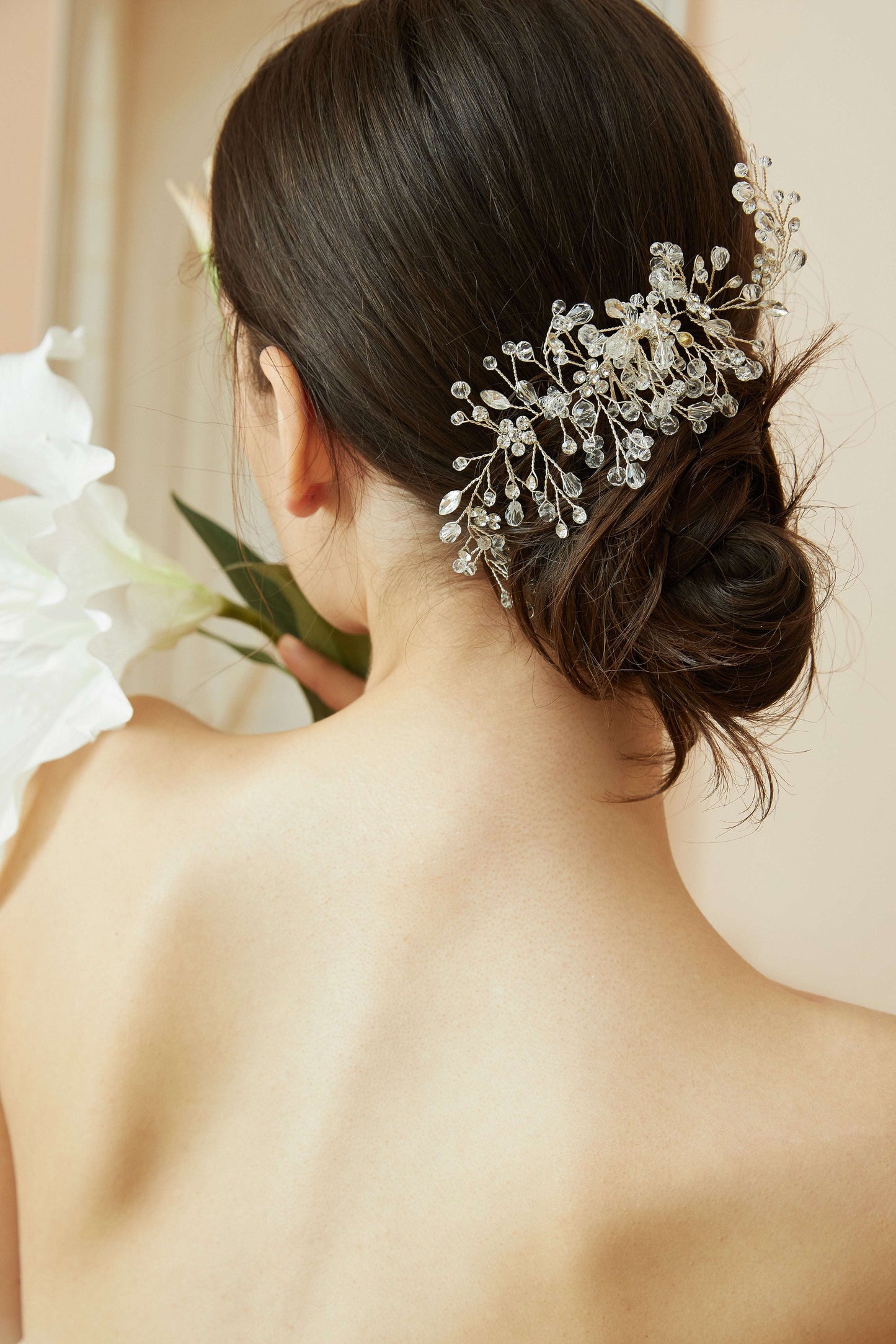 Bridesmaid wearing a vintage-inspired crystal hair comb