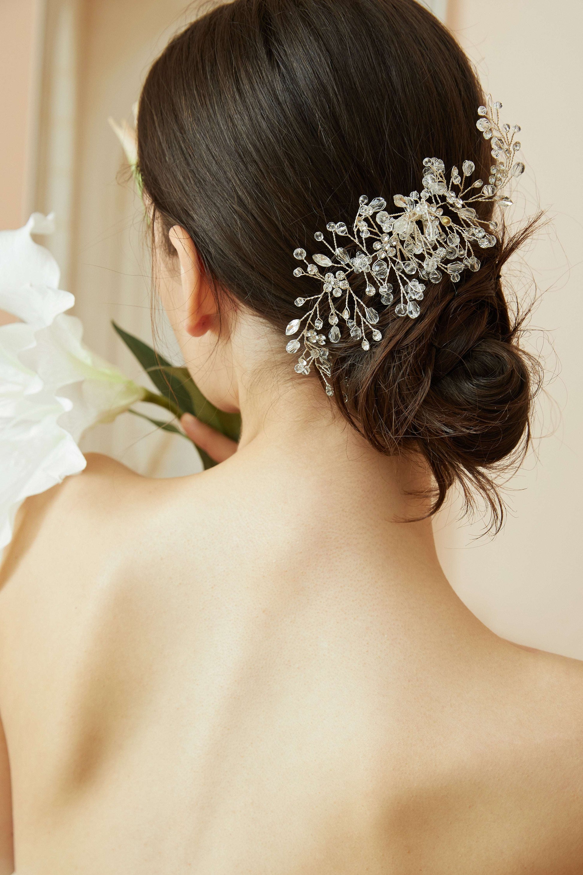 Bridesmaid wearing a vintage-inspired crystal hair comb