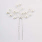 Delicate silver pearl bridal hair pin with a branch design