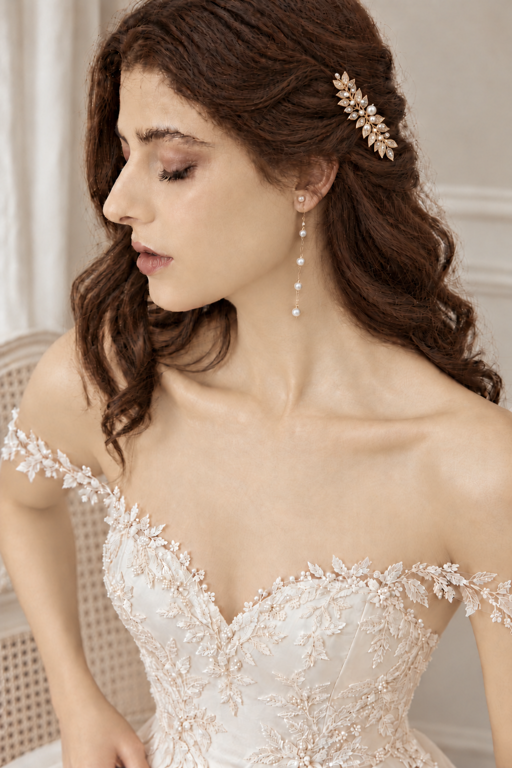 Bride wearing the gold leaf and CZ hair comb with long pearl chain earrings; choose the set option to receive both