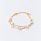 Angled full view of a double-strand freshwater pearl bracelet
