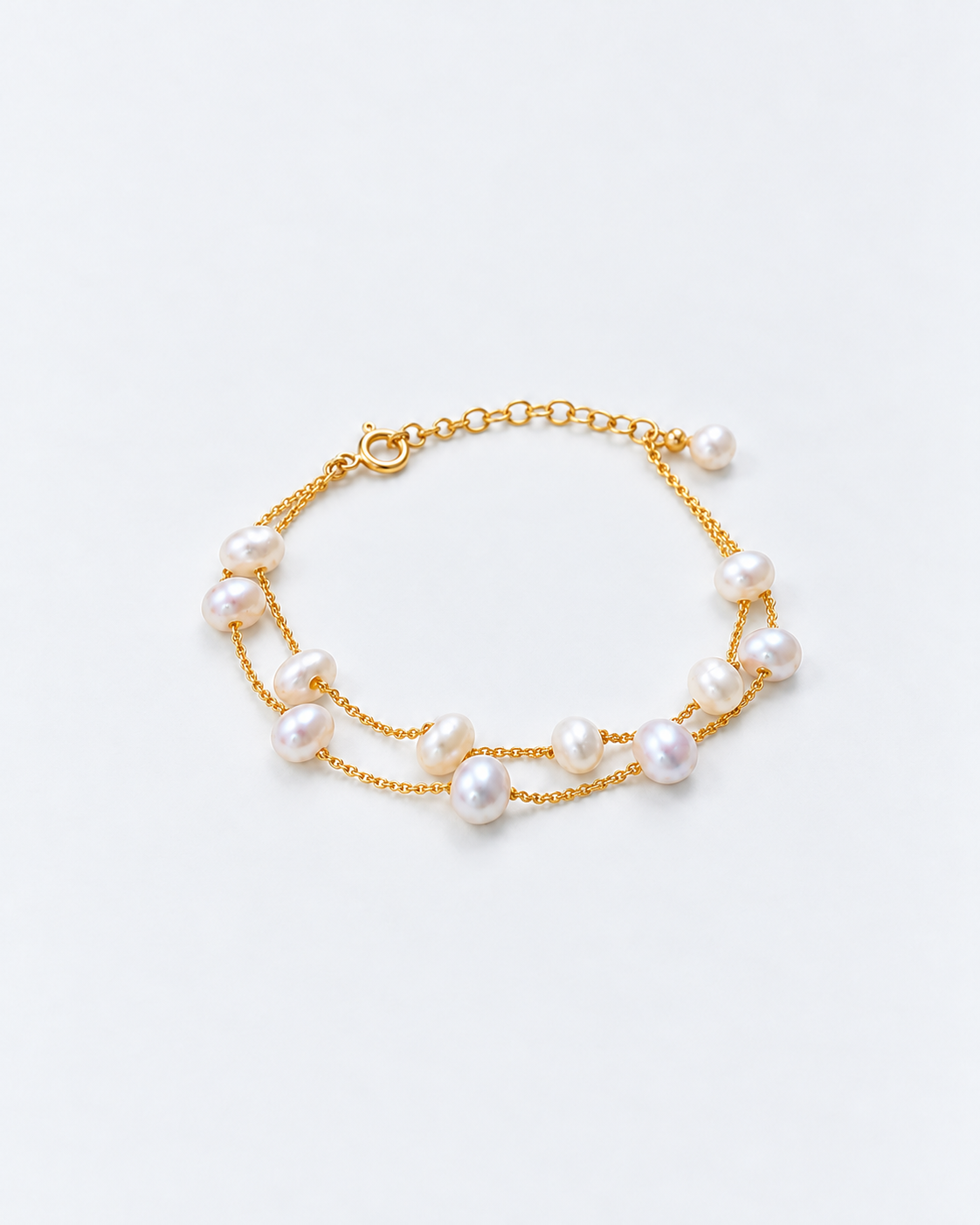 Angled full view of a double-strand freshwater pearl bracelet