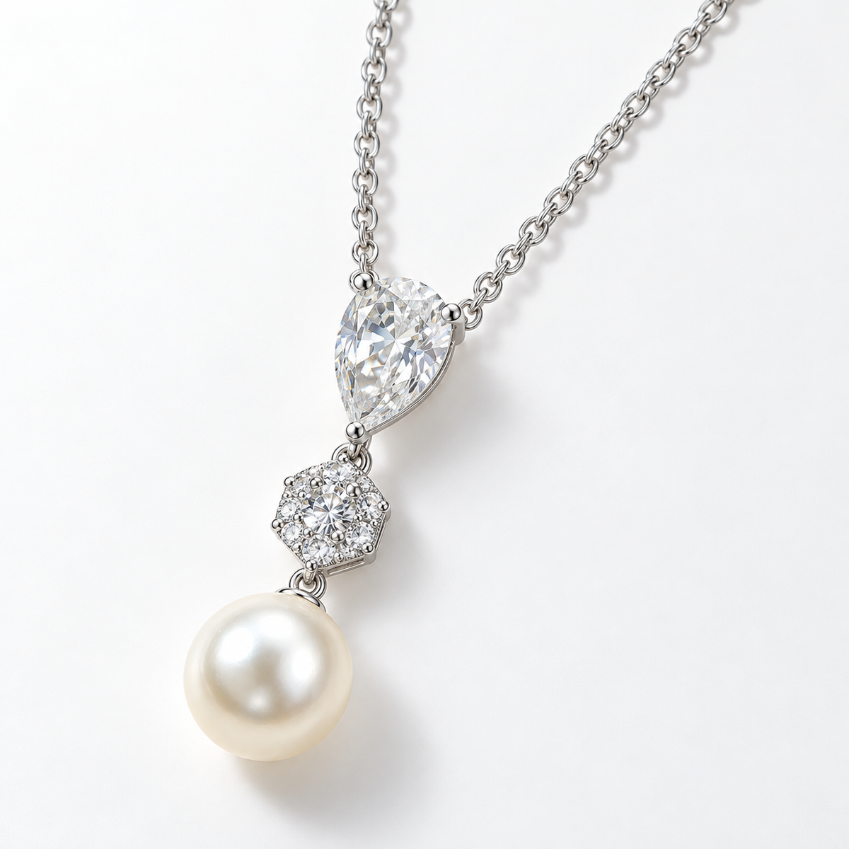 Close-up of the pear-shaped crystal and pearl necklace pendant