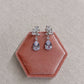 EVIE dainty drop earrings presented in a pink velvet jewellery box
