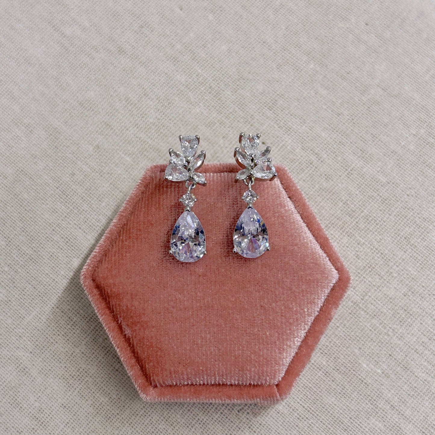 EVIE dainty drop earrings presented in a pink velvet jewellery box