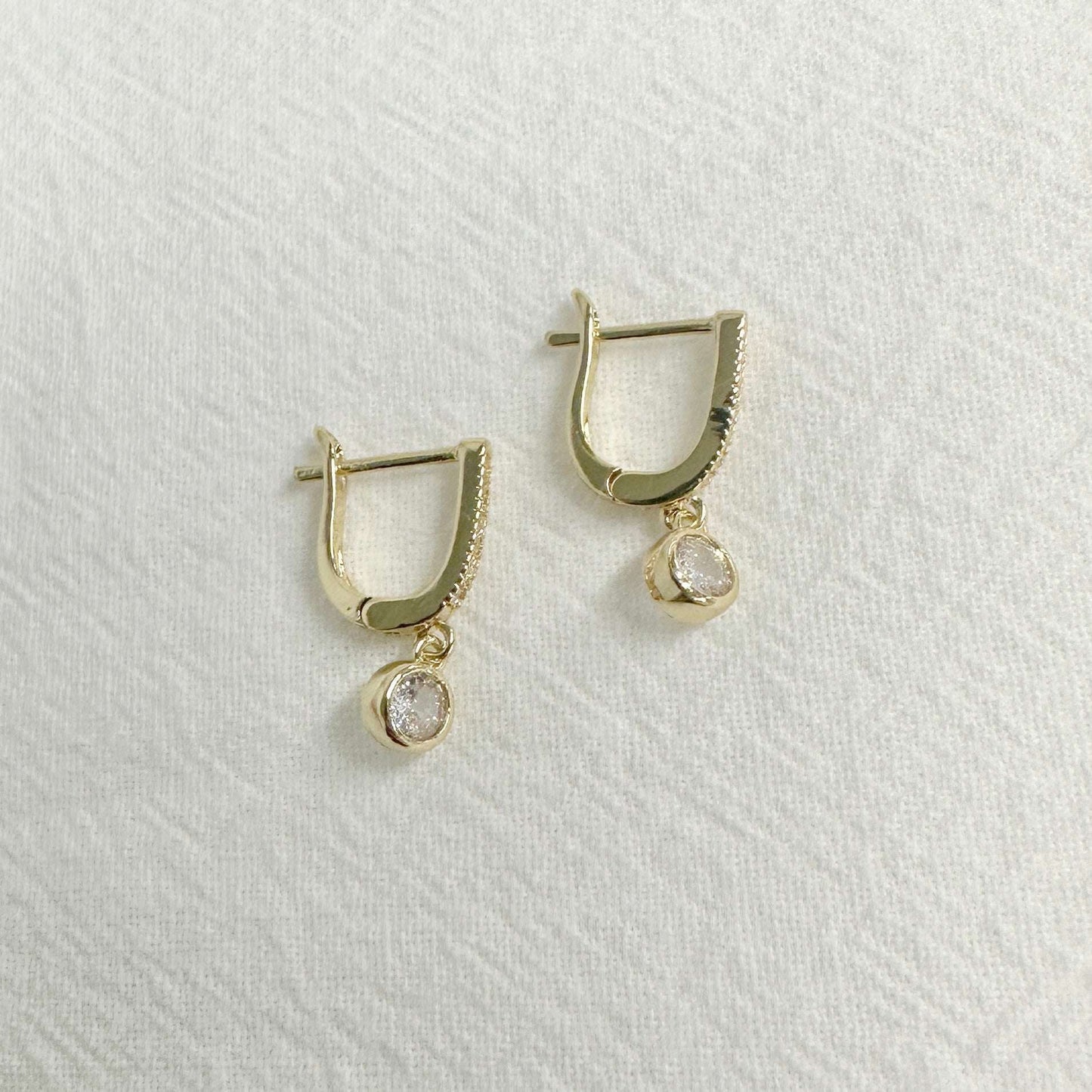 Pair of NATALIA gold plated drop earrings with sparkling CZ stones