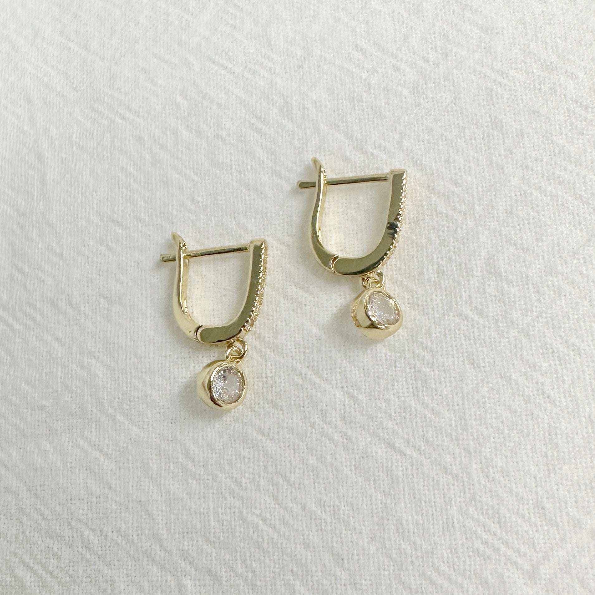 Pair of NATALIA gold plated drop earrings with sparkling CZ stones