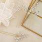 Close-up of the lustrous pearl on the handmade bridal hair pin