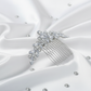 Side view of the crystal leaf bridal hair comb showing the twisted metal teeth