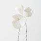 White ceramic flower hair pins flat lay — handcrafted porcelain bridal hair accessories by PearlandStone