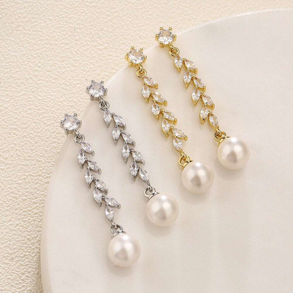 Gold and silver leaf crystal pearl drop earrings side-by-side
