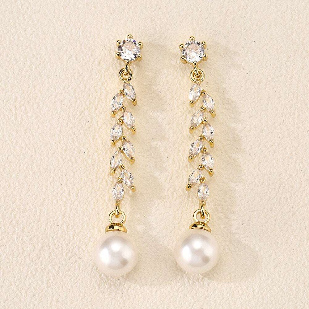 Gold-plated leaf design bridal earrings with sparkling crystals and pearl