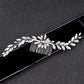 Sparkly rhinestone bridal hair comb on a black background