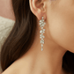 Crystal and pearl cascade drop earrings - full length side view showing complete earring