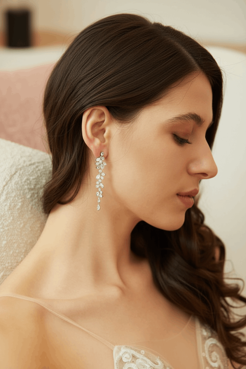 Crystal and pearl cascade drop earrings - bride head tilted down, earring natural drape