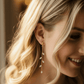 14K Gold Olive Leaf Crystal Drop Earrings - bride head tilted down, earring natural drape