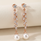 Rose gold leaf crystal and pearl bridal drop earrings