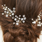 Close-up of the lustrous pearl on the handmade bridal hair pin