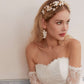 This beautifully hand-sculpted clay & pearl crown features individually crafted cherry blossom flowers, dainty freshwater pearls, and crystals. The result is a full, textured headband that makes a statement while remaining incredibly feminine.