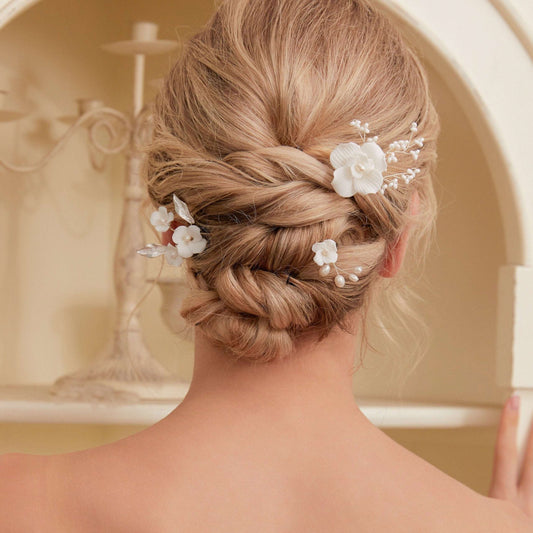 Set of 3 Elegant Pearl and Porcelain Floral Bridal Hairpins. Each hairpin features beautifully hand sculpted porcelain blossoms and dainty freshwater pearls, intricately arranged and hardwired using gold or silver plated wire. 