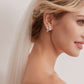 Luxurious single-layer cathedral wedding veil crafted from delicate sparkle glitter tulle. With an ivory base (also available in white and champagne), it features a simple cut edge for an elegant and timeless style that complements any bridal look.  At 3 meters long, this veil is the perfect bridal accessory to enhance any wedding dress. Offering a subtle sparkle without any fuss, it adds a touch of glamour to your special day.