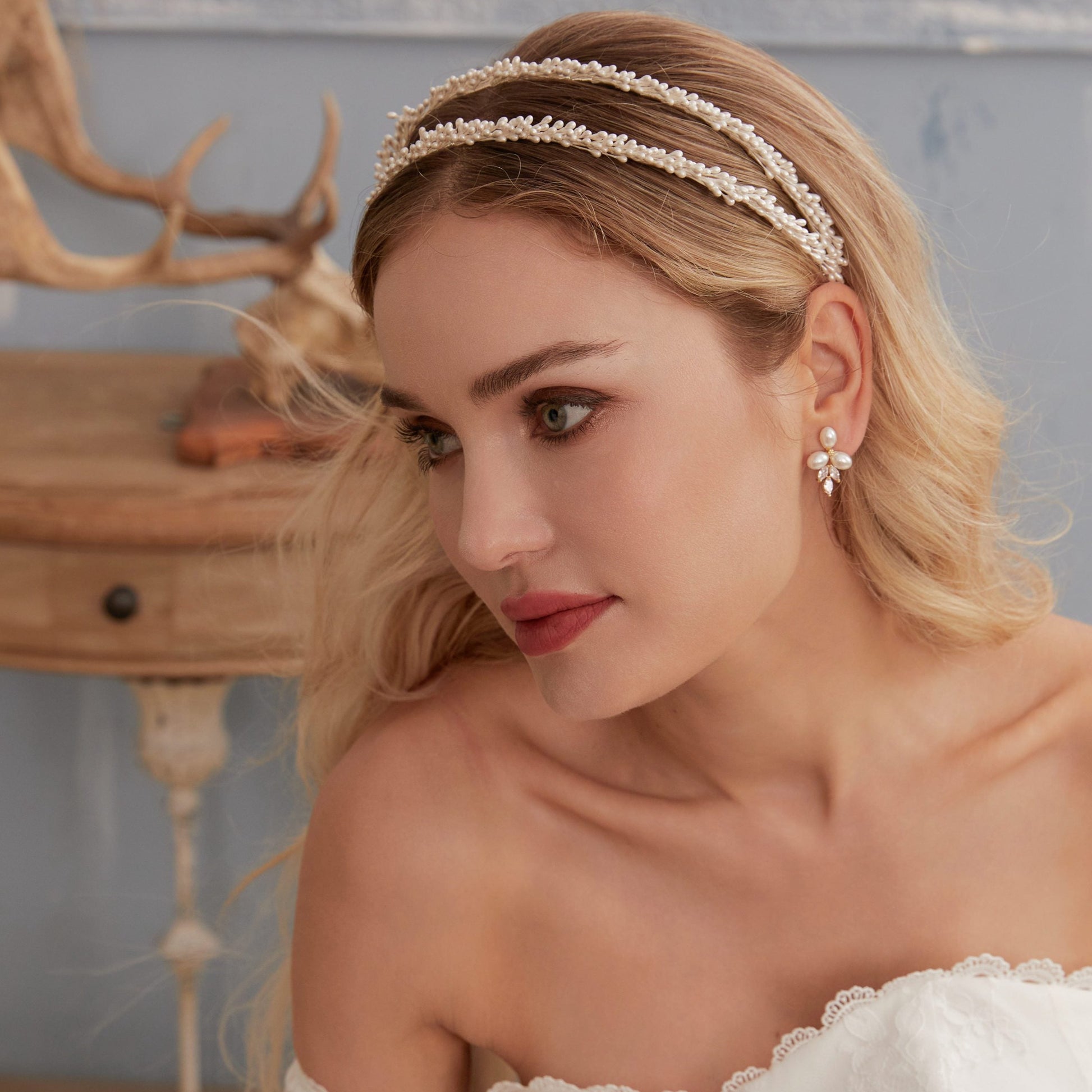 Stunning Baby's Breath-inspired wedding headband. Featuring two rows of delicate faux pearls resembling Baby's Breath flowers, this stunning bridal accessory adds a touch of magic to your wedding look.