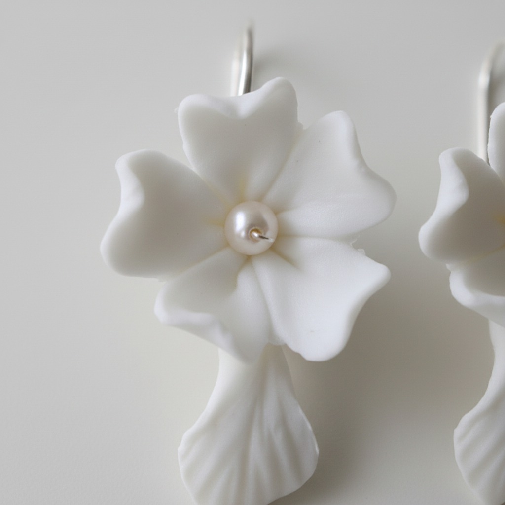 Two white porcelain ceramic flower hair pins with silver U-shaped wavy wire — bridal hair pins for updo and chignon