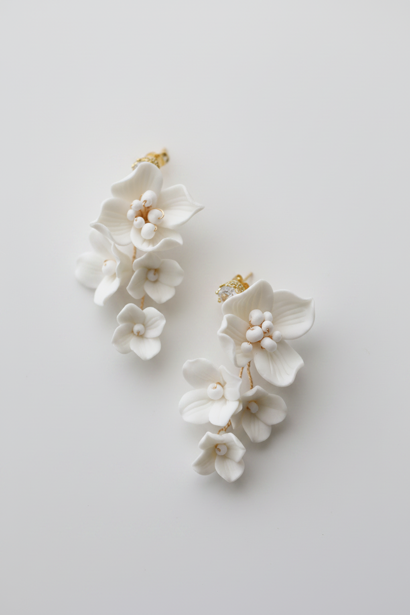 Handmade white ceramic flower drop earrings with bead details, 5-6cm length, bridal wedding jewellery
