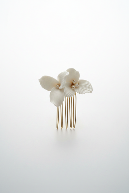 Handmade ceramic flower detail on bridal hair comb