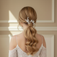 Model wearing the LILLIAN silver porcelain flower hairpin in a half-up style