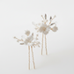 White porcelain flower bridal jewellery set with pearl beads in gold-tone finish