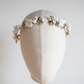 Delicate porcelain blooms handcrafted bridal headpiece
