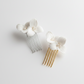 Handmade ceramic flower detail on bridal hair comb
