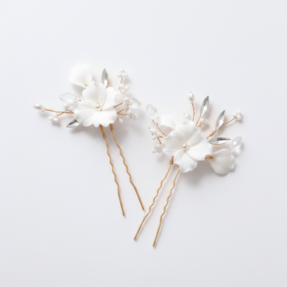 White porcelain flower bridal jewellery set with pearl beads in gold-tone finish